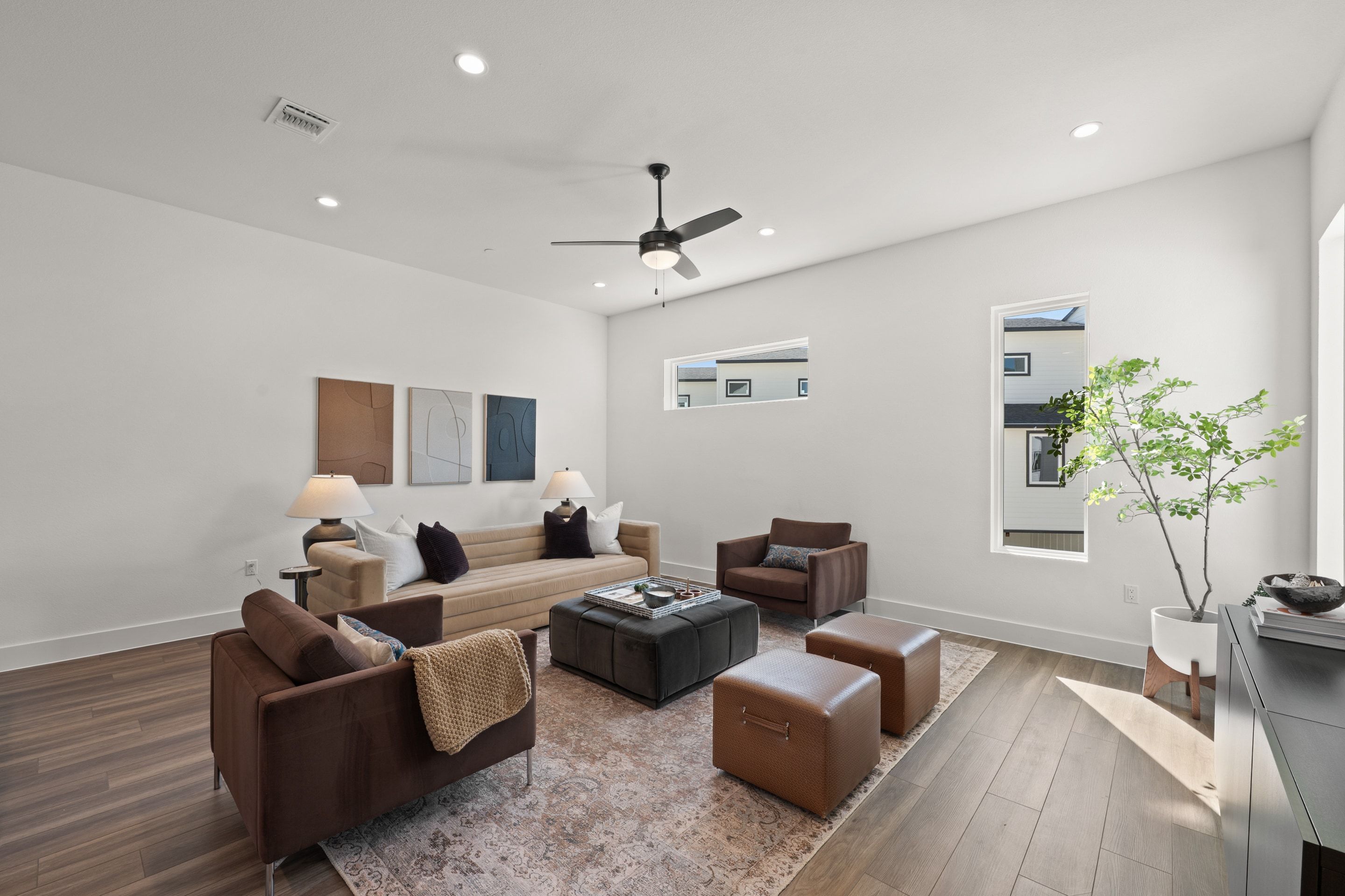 Nest plan living space, staged and open to natural light