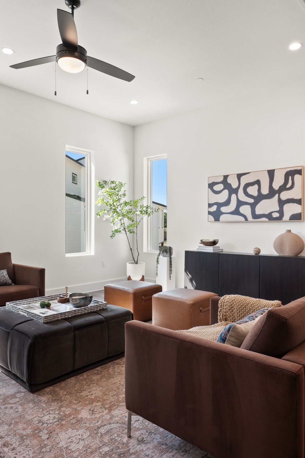 Nest plan open living and dining space, staged