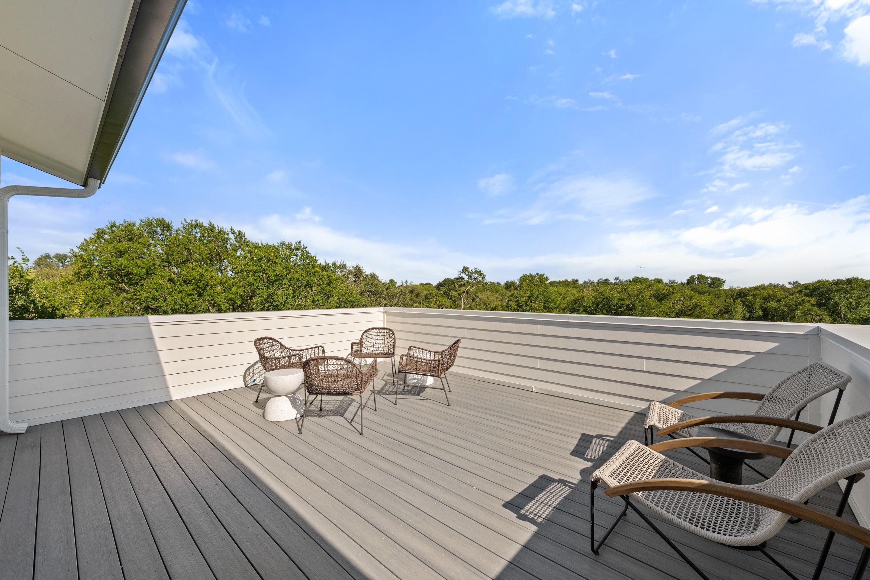 Private rooftop terrace at Overlook Residences overlooking the East Austin treeline