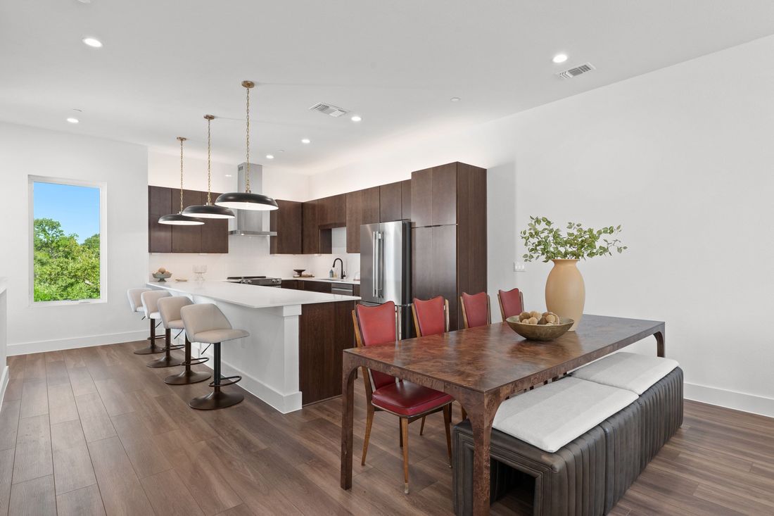 Dining area with natural light next to the kitchen