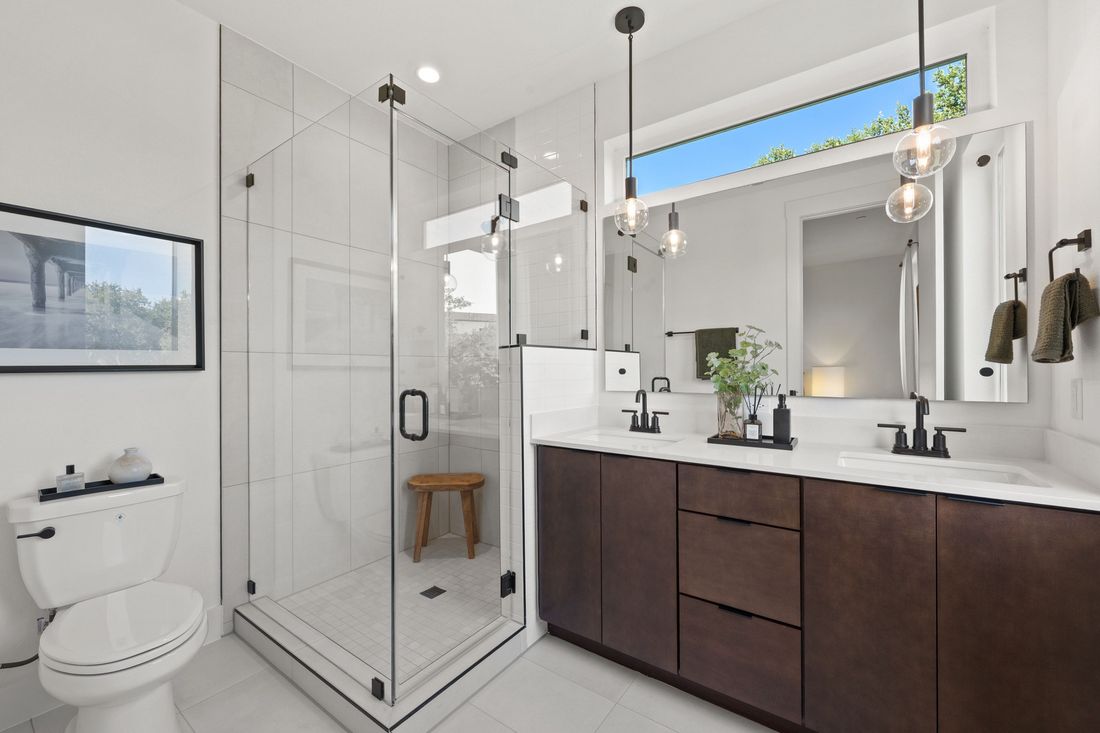 Primary bathroom with vanity and walk-in shower